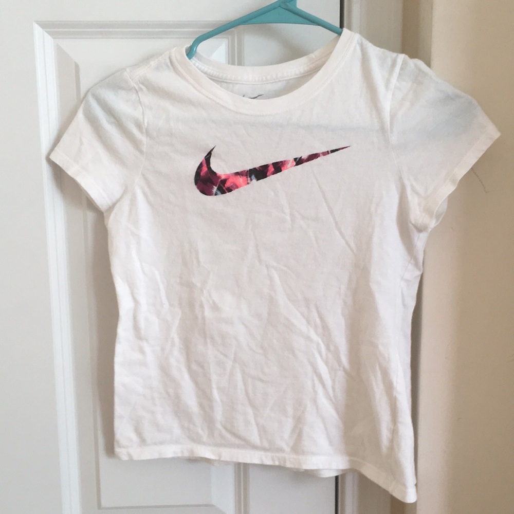 Nike girls white shirt with floral swoosh pattern